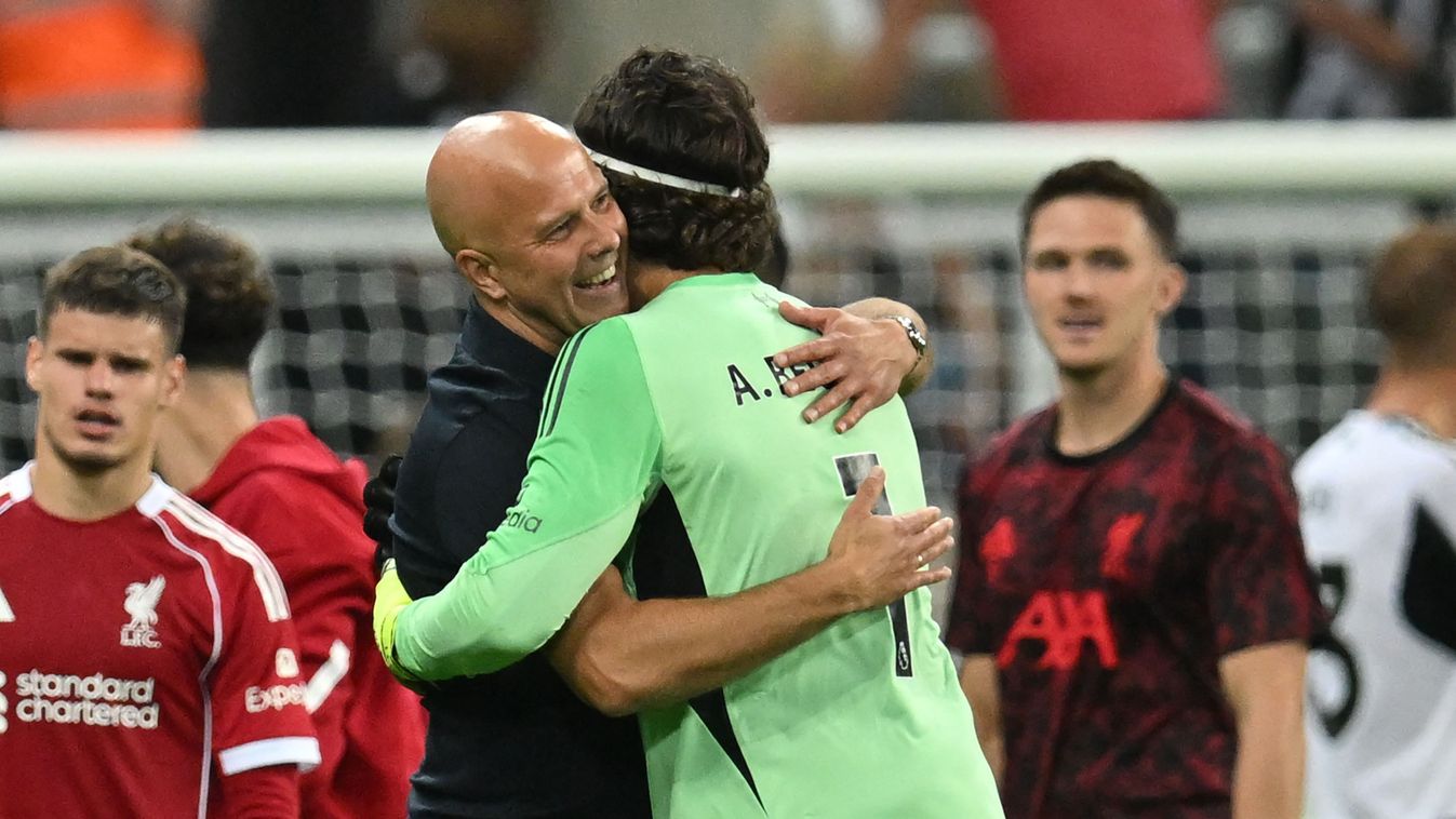 Liverpool
Liverpool's Dutch manager Arne Slot (L) embraces Liverpool's Brazilian goalkeeper #01 Alisson Becker (R) after the English Premier League football match between Newcastle United and Liverpool at St James' Park in Newcastle-upon-Tyne, north east 