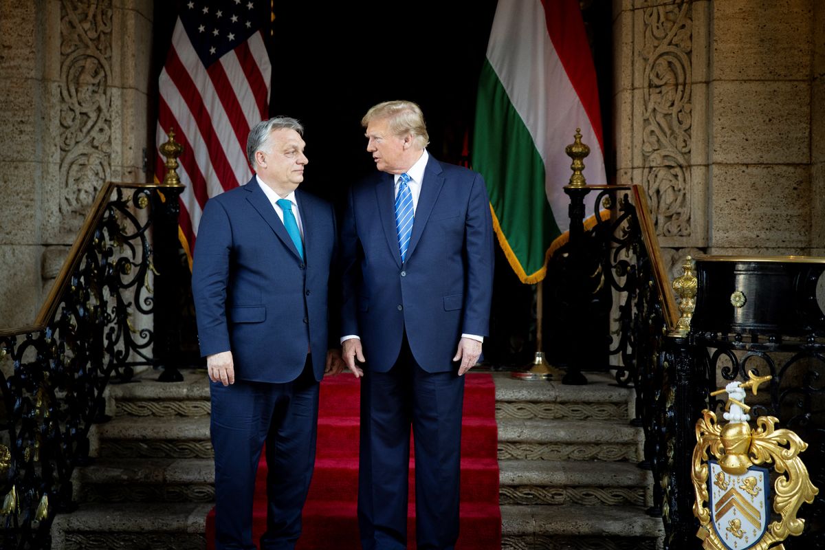 This handout photograph taken and released on March 8, 2024, by the Press Office of the Hungarian Prime Minister, shows Hungarian Prime Minister Viktor Orban (L) and former US President and Republican presidential candidate, Donald Trump during their meeting at Trump's Mar-a-Lago residence in Palm Beach, Florida. (Photo by ZOLTAN FISCHER / HUNGARIAN PRIME MINISTER'S OFFICE / AFP) / RESTRICTED TO EDITORIAL USE - MANDATORY CREDIT "AFP PHOTO / PRESS OFFICE OF THE HUNGARIAN PRIME MINISTER" - NO MARKETING NO ADVERTISING CAMPAIGNS - DISTRIBUTED AS A SERVICE TO CLIENTS