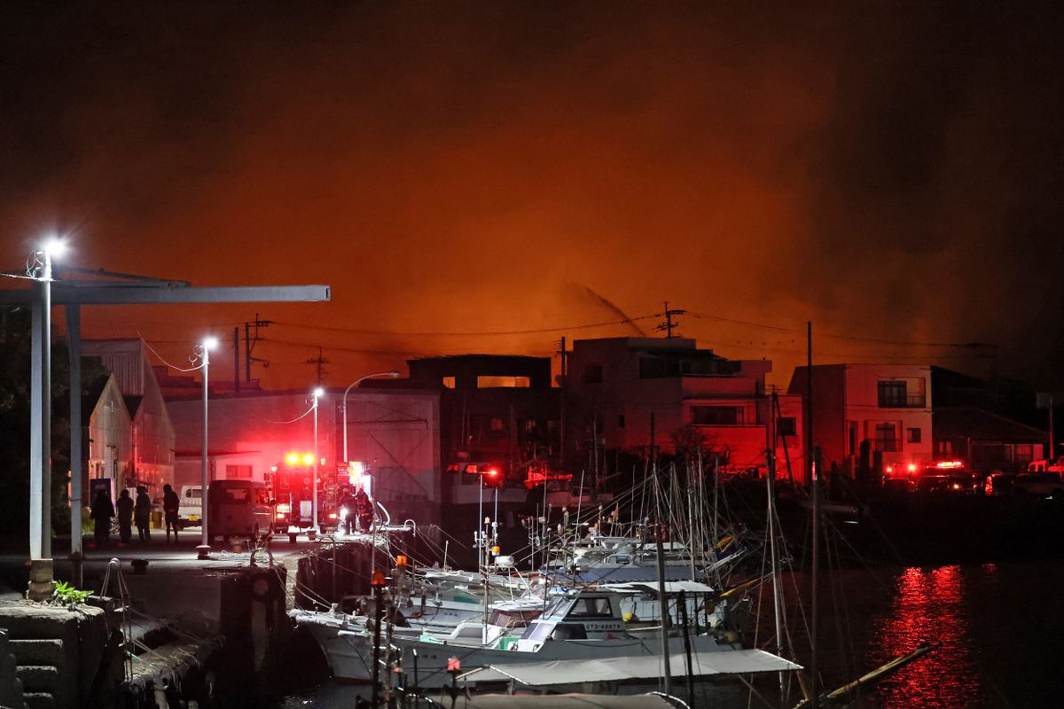 The photo shows the scene of a large-scale fire in Oita City, Oita Prefecture, Kyushu, on November 19, 2025. The fire broke out on the evening of the 18th, and by the early hours of the 19th, it had spread to over 170 buildings. The fire site is located approximately 25 kilometers east of central Oita City. ( The Yomiuri Shimbun ) (Photo by Fumito Saeki / The Yomiuri Shimbun via AFP)