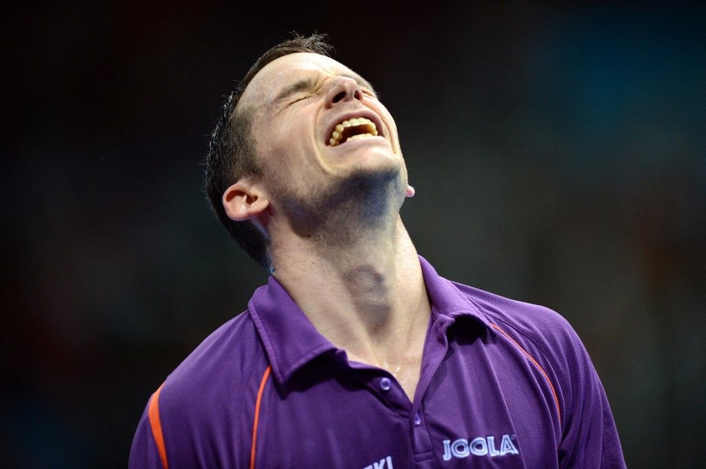 Daniel Zwickl of Hungry celebrates his victory over Aleksandar Karakasevic of Serbia during their London 2012 Olympic Games table tennis men's singles preliminary round match at the Excel centre in London on July 29, 2012. AFP Photo / Saeed Khan (Photo by SAEED KHAN / AFP)