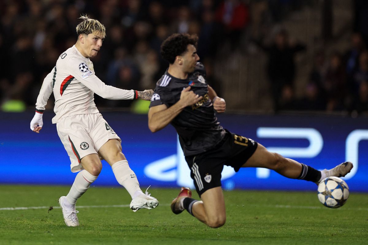 Chelsea's Argentinian midfielder #19 Alejandro Garnacho shoots and scores the team's second goal during the UEFA Champions League league phase football match between Qarabag and Chelsea at the Tofiq Bahramov Republican Stadium in Baku on November 5, 2025. (Photo by Giorgi ARJEVANIDZE / AFP)