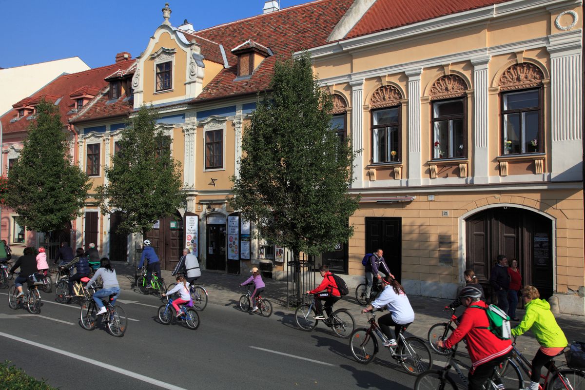 Hungary, Sopron, street scene, cyclists, people,