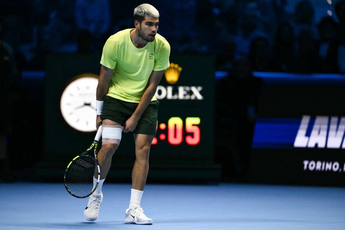 Spain's Carlos Alcaraz gestures during the men's single final match against Italy's Jannik Sinner at the ATP Finals tennis tournament, in Turin, on November 16, 2025. (Photo by Marco BERTORELLO / AFP)