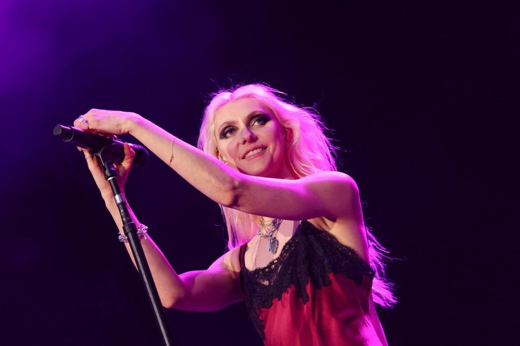 US singer Taylor Momsen of US rock band The Pretty Reckless performs on stage at the Rose Bowl Stadium in Pasadena, California on April 18, 2025, as the opening act of AC/DC Power Up Tour. (Photo by VALERIE MACON / AFP) / RESTRICTED TO EDITORIAL USE