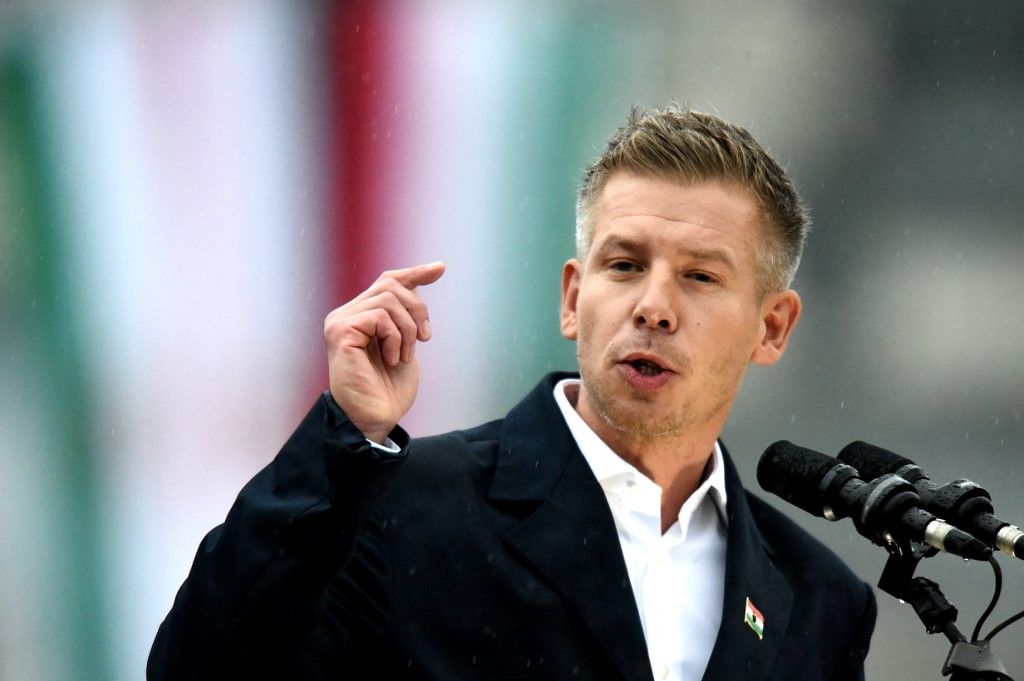 Peter Magyar, leader of the Tisza Party, speaks at the memorial of the Tisza Party on the 69th anniversary of the breakout of the Hungarian Revolution of 1965, in Budapest, Hungary, on October 23, 2025. (Photo by Balint Szentgallay/NurPhoto) (Photo by Balint Szentgallay / NurPhoto via AFP)