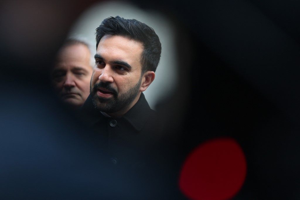 NEW YORK, NEW YORK - NOVEMBER 17: New York City Mayor-elect Zohran Mamdani speaks with members of the media after handing out food at Part of the Solution (POTS) on November 17, 2025 in the Fordham neighborhood of the Bronx borough in New York City. Mamdani along with Councilmember Oswald Feliz, helped distribute free hot meals to Bronx residents and spoke afterwards about how his upcoming administration plans to help alleviate food insecurity and the importance of food banks and mutual aid groups.   Michael M. Santiago/Getty Images/AFP (Photo by Michael M. Santiago / GETTY IMAGES NORTH AMERICA / Getty Images via AFP)