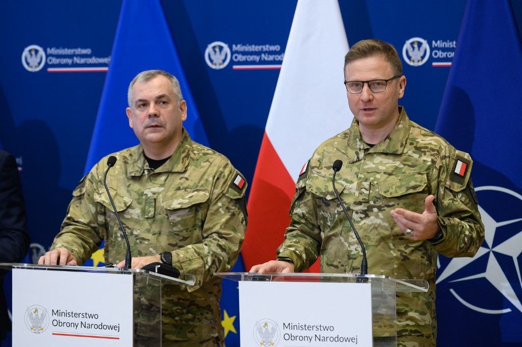 Chief of the General Staff of the Polish Armed Forces, General Wieslaw Kukula, and the Division General of the Polish Cyberspace Defence Forces, Karol Molenda, take part in a press conference at the General Staff of the Polish Army in Warsaw, Poland, on November 6, 2025. The Polish Deputy Prime Minister and Minister of Defence, Wladyslaw Kosiniak-Kamysz, holds a press conference in which he presents, together with State Secretary at the defence ministry Cezary Tomczyk, the Chief of the General Staff of the Polish Armed Forces, General Wieslaw Kukula, and the Division General of the Polish Cyberspace Defence Forces, Karol Molenda, a new defence public training programme called ''wGotowosci'' (In readiness). This programme is aimed at every Polish citizen from the age of 18 who wants to deepen their knowledge about defence, first aid in situations of natural disaster or armed conflict, and cyber security, among others. Every Polish citizen can sign up for the training voluntarily via the government's ID App mObywatel. The government, led by Prime Minister Donald Tusk, aims to train 100,000 volunteers annually by 2027 and works to increase the availability of training for citizens, as well as enhance national security through initiatives like improved emergency shelters and self-defense courses for the public. (Photo by/NurPhoto) (Photo by Aleksander Kalka / NurPhoto via AFP)