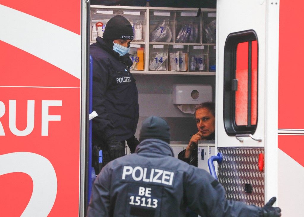 BERLIN, GERMANY - NOVEMBER 25: Police steps into an ambulance in front of the German Chancellery after a car crashed into the outer gate of German Chancellor Angela Merkel's office in Berlin, Germany on November 25, 2020. Multiple police units responded to the scene, blocking off the area of the incident. The identity and motive of the driver were not immediately known. Abdulhamid Hosbas / Anadolu Agency (Photo by ABDULHAMID HOSBAS / ANADOLU AGENCY / Anadolu via AFP)