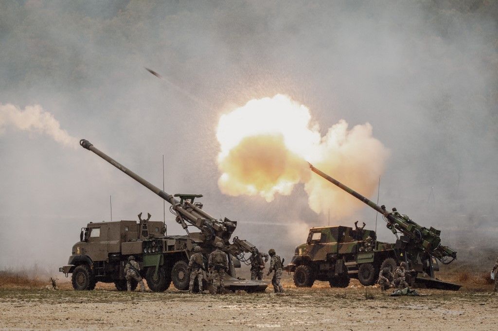 Soldiers operate CAESAR vehicles (Camion Equipe d'un Systeme d'Artillerie - Truck equipped with an artillery system) with self-propelled howitzers during maneuvers as part of an artillery demonstration day at the French Army camp of Canjuers, in the Var department, south-eastern France, on October 20, 2025. The artillery demonstration day is organised by the French Army (Armee de Terre) and European defence industry group KNDS. (Photo by Frederic DIDES / AFP)