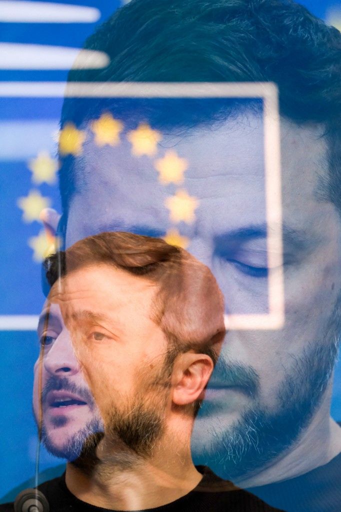 Double exposure photo of press conference of President of Ukraine Volodymyr Zelenskyy (or Zelensky) at the summit of Heads of State and Government of the European Union at the European Council in Brussels in Belgium on 19 December 2024. (Photo by Martin Bertrand / Hans Lucas via AFP)
