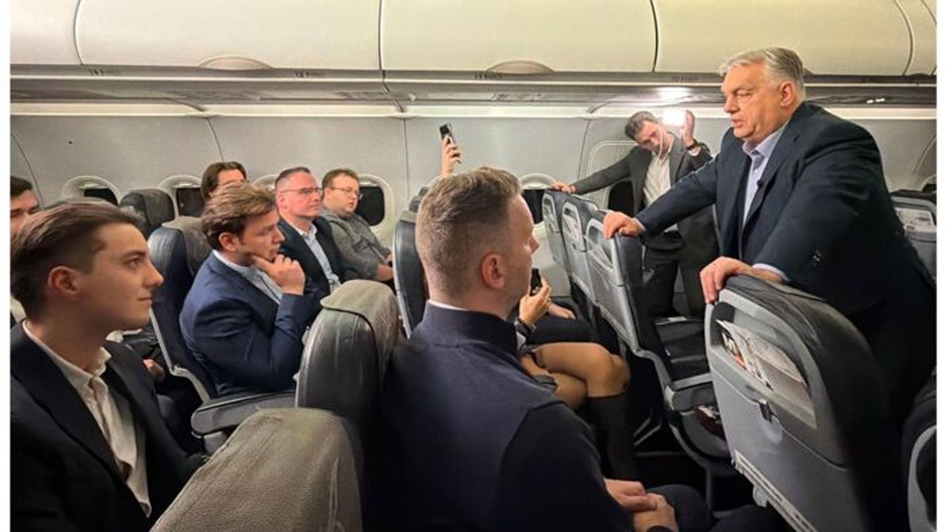 Prime Minister Viktor Orban holds an in-flight briefing