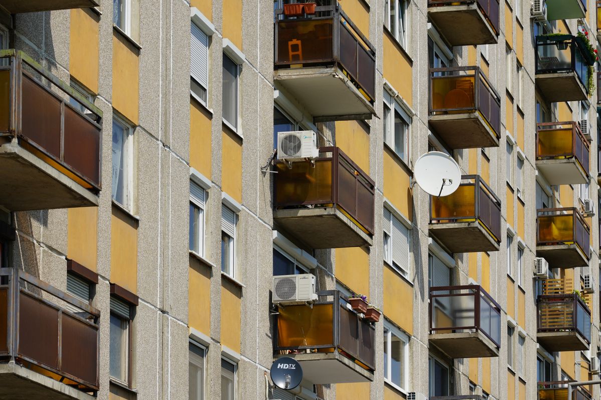 Residential buildings with small balconies are in Budapest, Hungary, on May 20, 2023 (Photo by Michael Nguyen/NurPhoto). (Photo by Michael Nguyen / NurPhoto via AFP)