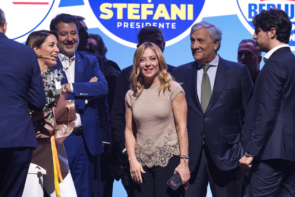 Giorgia Meloni, President of the Council of Ministers of the Italian Republic and leader of the Fratelli d'Italia party, Antonio Tajani, Minister of Foreign Affairs and International Cooperation and leader of the Forza Italia party, and Matteo Salvini, Minister of Infrastructure and Transport and leader of the Lega party, are seen during the closing event of the center-right coalition's campaign for the Veneto regional elections in support of Alberto Stefani at the Gran Teatro Geox in Padova, Italy, on November 18, 2025 (Photo by Alessandro Bremec/NurPhoto). (Photo by Alessandro Bremec / NurPhoto via AFP)
