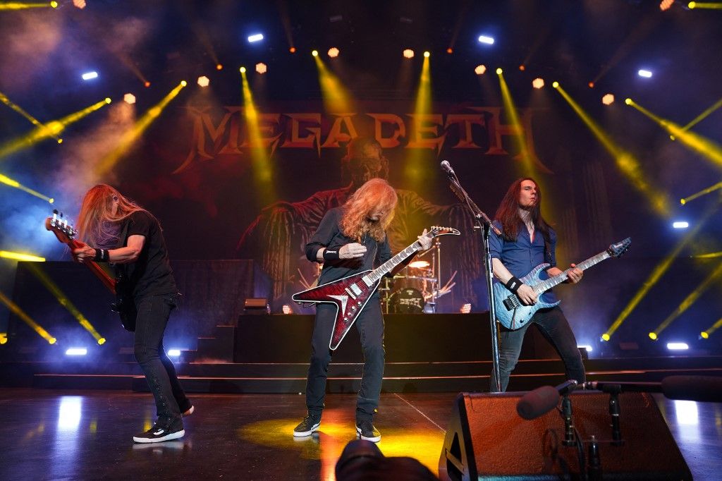 James LoMenzo, Dave Mustaine, and Teemu Mantysaari, members of the American thrash metal band Megadeth, perform during the Megadeth 'Destroy All Enemies' Tour at the Toyota Music Factory in Irving, Texas, United States, on August 20, 2024. (Photo by Javier Vicencio / Eyepix Group) (Photo by Eyepix/NurPhoto) (Photo by Eyepix / NurPhoto via AFP)