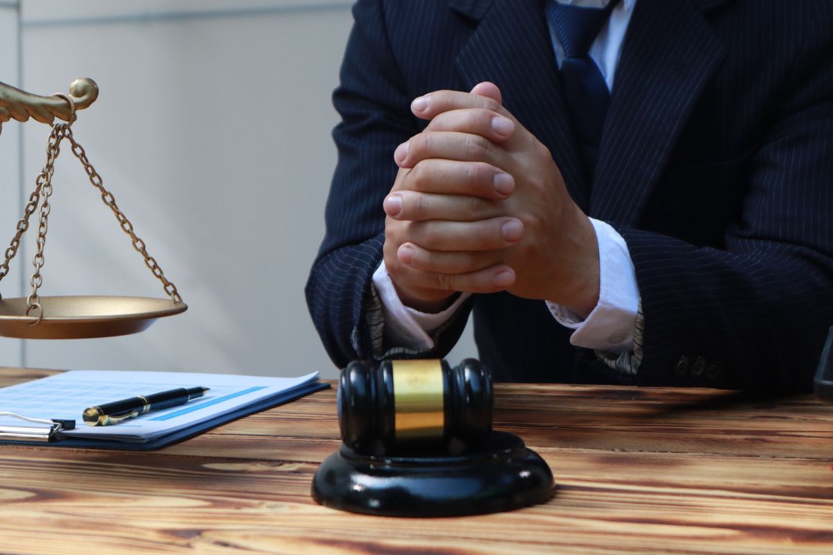 A lawyer is a legal adviser who helps people with court cases, contracts, and justice matters. They work in offices, handle legal documents, and provide advice on law and rights