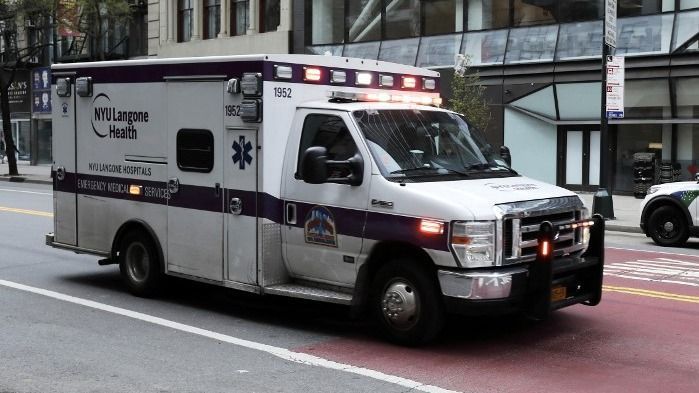 An ambulance and a police car in New York in the USA on April 16, 2025. Life on the streets of Manhattan. (Photo by Daniel Perron / Hans Lucas via AFP)