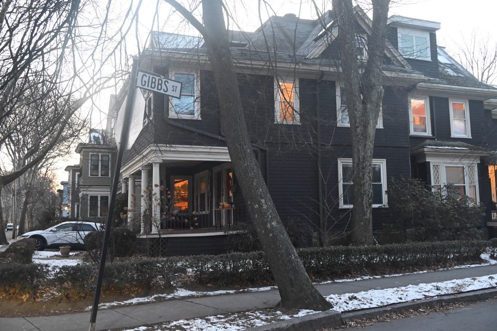 A memorial with flowers is placed outside the home of Professor Nuno F.G. Loureiro, who is fatally shot overnight at his home on Gibbs Street in Brookline, Massachusetts, United States, on December 16, 2025. Loureiro is taken Monday evening to Beth Israel Deaconess Medical Center in Boston, where he is pronounced dead. MIT confirms in a statement that Loureiro is a member of their faculty in the Nuclear Science & Engineering and Physics department and the director of MIT's Plasma Science and Fusion Center. There are no arrests, and the investigation is ongoing. (Photo by Kyle Mazza/NurPhoto) (Photo by Kyle Mazza / NurPhoto via AFP)