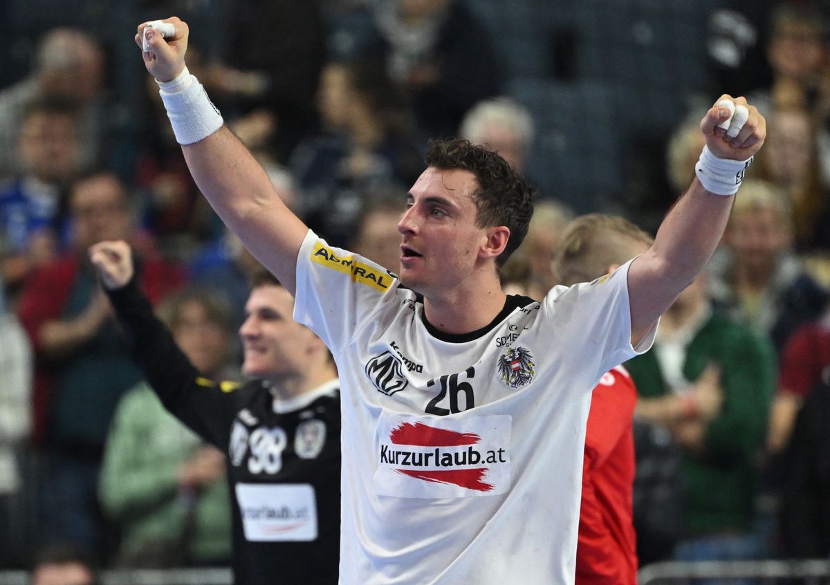 Austria's pivot #26 Lukas Herburger reacts after the Men's EURO 2024 EHF Handball European Championship main round match between Hungary and Austria in Cologne, western Germany on January 18, 2024. (Photo by INA FASSBENDER / AFP)