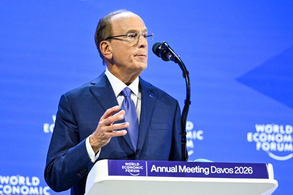 BlackRock chairman and WEF co-chairman Larry Fink speaks before US President' special address during the World Economic Forum (WEF) annual meeting in Davos on January 21, 2026. The World Economic Forum takes place in Davos from January 19 to January 23, 2026. (Photo by Mandel NGAN / AFP)