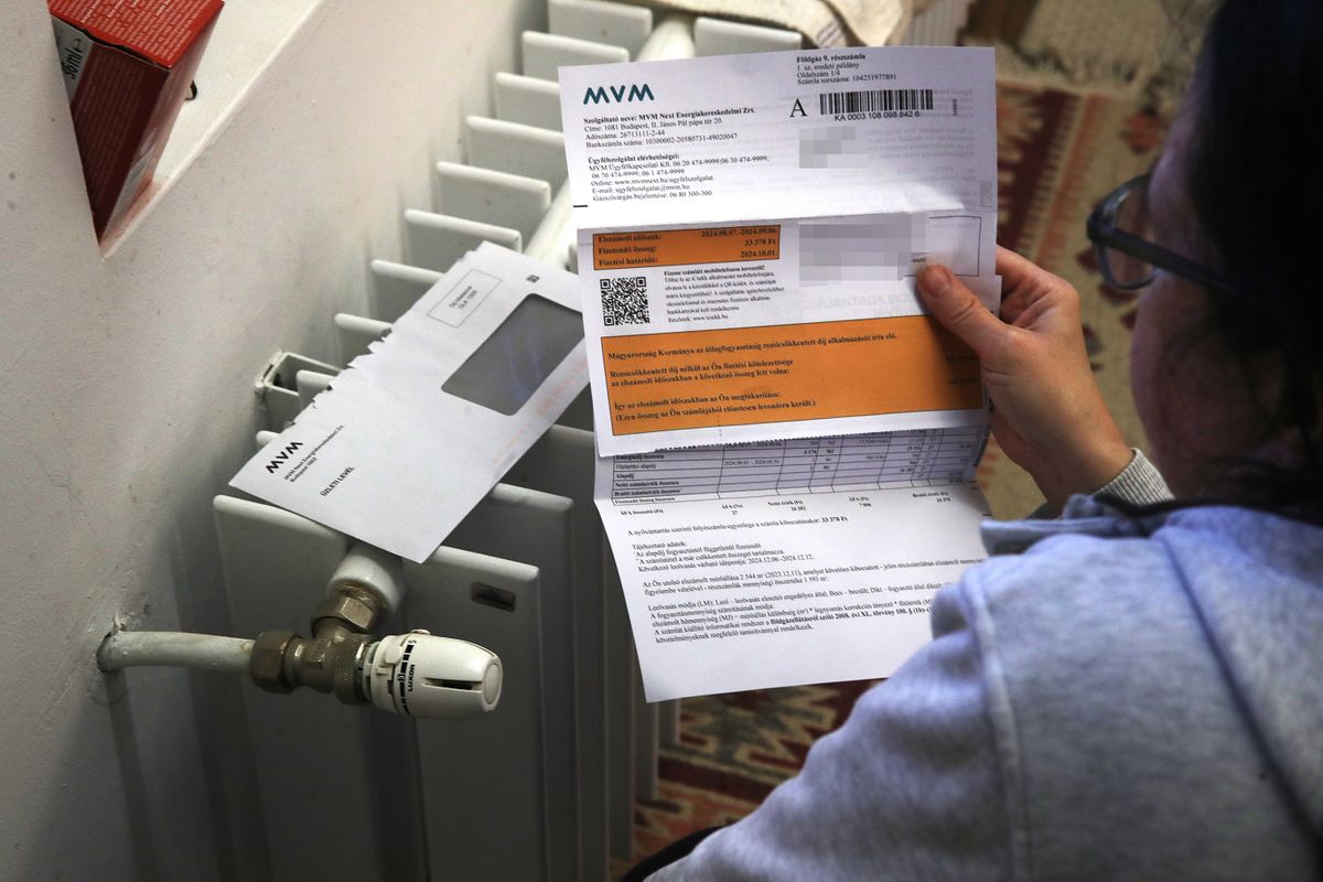 rezsistop, 20250205 DunaharasztiRezsi rezsicsökkentésillusztrációkFotó: Havran Zoltán HZMagyar Nemzet MNA képen: közüzemi számlacsekk radiátor fűtés