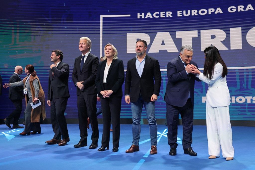 (From R) Greek politician, founder and leader of the far-right party Voice of Reason, Afroditi Latinopoulou, Hungarian Prime Minister Viktor Orban, Spain's far-right party Vox leader and President of Patriots for Europe Santiago Abascal, President of the French far-right Rassemblement National (RN) parliamentary group, Marine Le Pen, President of the far-right Party for Freedom (PVV) Geert Wilders and leader of Chega right-wing party Andre Ventura gather onstage at the end of a meeting of Patriots for Europe, the European Parliament's largest far-right bloc, at a hotel in Madrid on February 8, 2025. With Viktor Orban and Marine Le Pen as headliners, and under the slogan "Make Europe Great Again" inspired by former U.S. President Donald Trump's "Make America Great Again," which calls for restoring America's greatness numerous European far-right leaders gathered in Madrid today to advocate for a "180-degree change" in the European Union, leveraging the Trumpist momentum. (Photo by Thomas COEX / AFP)