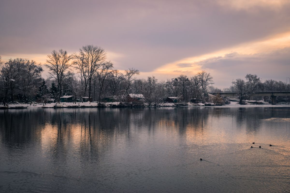 Drava river in Varaždin, Croatia during sunrise in Winter