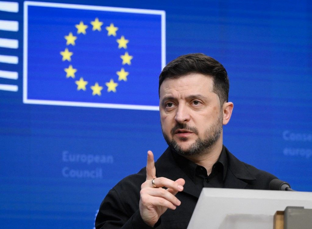 Ukraine's President Volodymyr Zelensky speaks during a press conference as part of the European Council meeting in Brussels on December 18, 2025. European Unions leaders meet in Brussels on December 18 and 19, 2025, to discuss in particular the need to support Ukraine, transatlantic relations and the EU's strategic autonomy. (Photo by JOHN THYS / AFP)