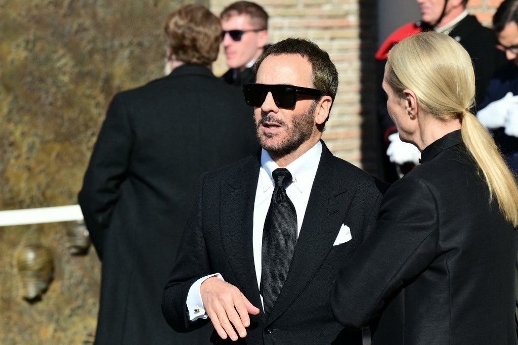 US fashion designer Tom Ford leaves the funeral ceremony for the late Italian fashion designer Valentino Gavarani at the Basilic of Santa Maria degli Angeli e dei Martiri, in Rome on January 23, 2026. (Photo by Stefano RELLANDINI / AFP)