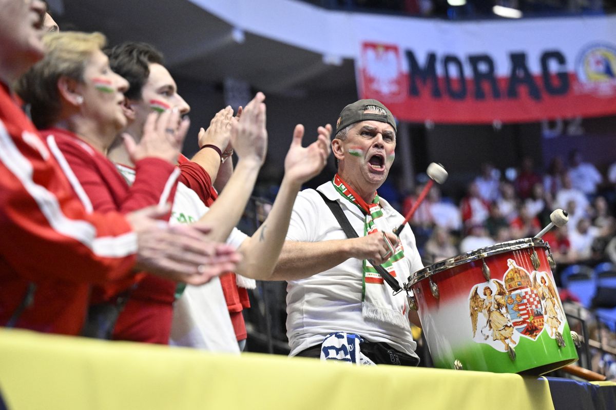Hungary's fans cheer on their team during the men's EHF Euro 2026 preliminary round group F handball match Hungary vs Poland in Kristianstad, Sweden, on January 16, 2026. (Photo by Johan Nilsson/TT / TT NEWS AGENCY / AFP) / Sweden OUT