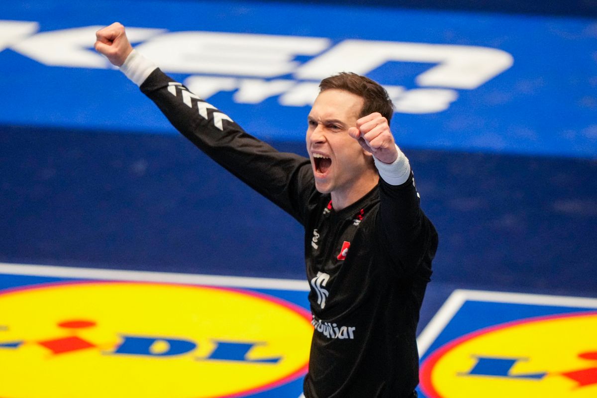 Switzerland's goalkeeper #16 Nikola Portner reacts during the men's EHF Euro 2026 preliminary round handball match Switzerland vs Slovenia in Oslo, Norway, on January 18, 2026. (Photo by Cornelius Poppe / NTB / AFP) / Norway OUT