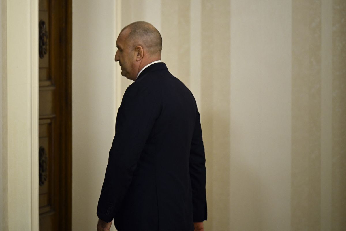Bulgaria's President Rumen Radev leaves a press conference after announcing his resignation in Sofia on January 19, 2026, ahead of snap elections expected in spring. (Photo by Nikolay DOYCHINOV / AFP)