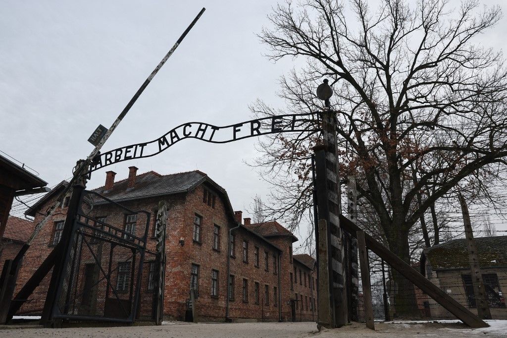 A view of the 'Arbeit Macht Frei' sign at the former Nazi German concentration camp Auschwitz-Brikenau in Oswiecim, Poland on January 22, 2026. (Photo by Jakub Porzycki/NurPhoto) (Photo by Jakub Porzycki / NurPhoto via AFP)