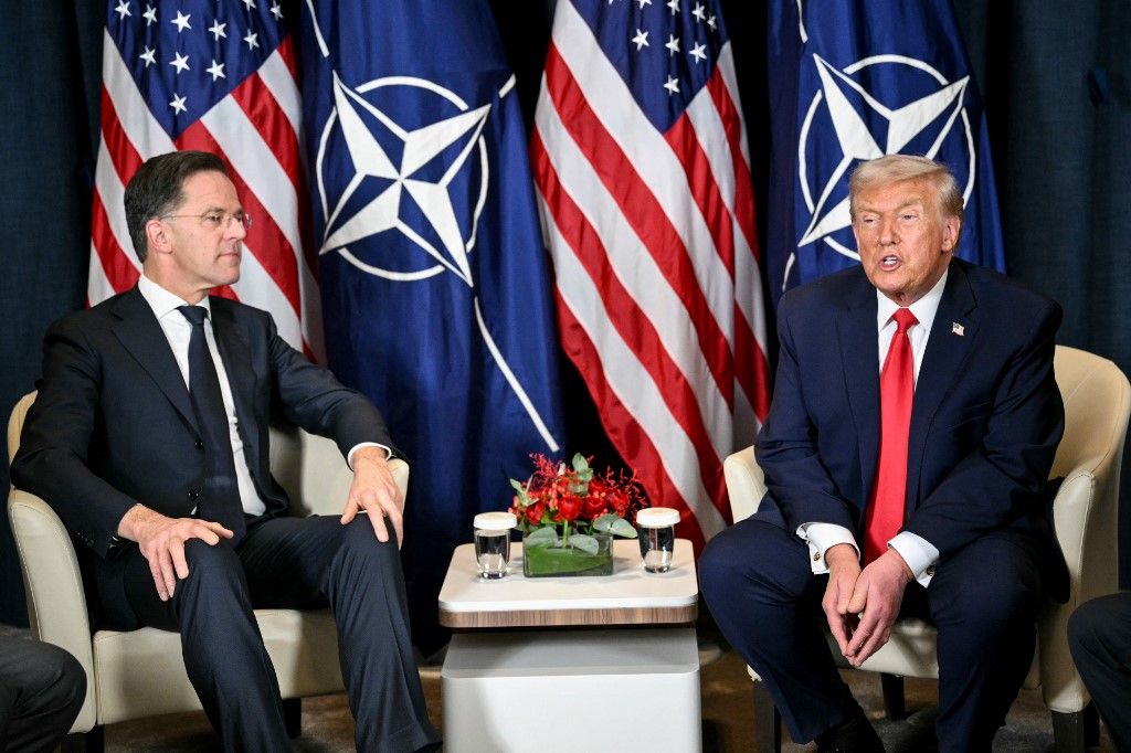 US President Donald Trump (R) speaks with NATOs Secretary-General Mark Rutte during a bilateral meeting on the sidelines of the World Economic Forum (WEF) annual meeting in Davos on January 21, 2026. The World Economic Forum takes place in Davos from January 19 to January 23, 2026. (Photo by Mandel NGAN / AFP)