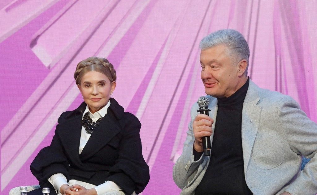 Yulia Tymoshenko, the Batkivshchyna party leader and MP, and Petro Poroshenko, the European Solidarity party leader and MP, attend the Eighth Ukrainian Women's Congress in Kyiv, Ukraine, on November 5, 2024. This year's theme is ''Women's Potential: New Roles, New Quality''. (Photo by Ukrinform/NurPhoto) (Photo by Volodymyr Tarasov / NurPhoto via AFP)