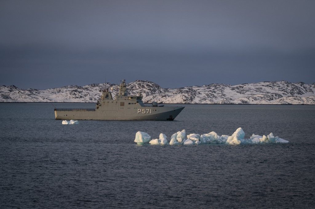 A naval vessel patrols on January 15, 2026 in Nuuk, Greenland. (Photo by Alessandro RAMPAZZO / AFP)
