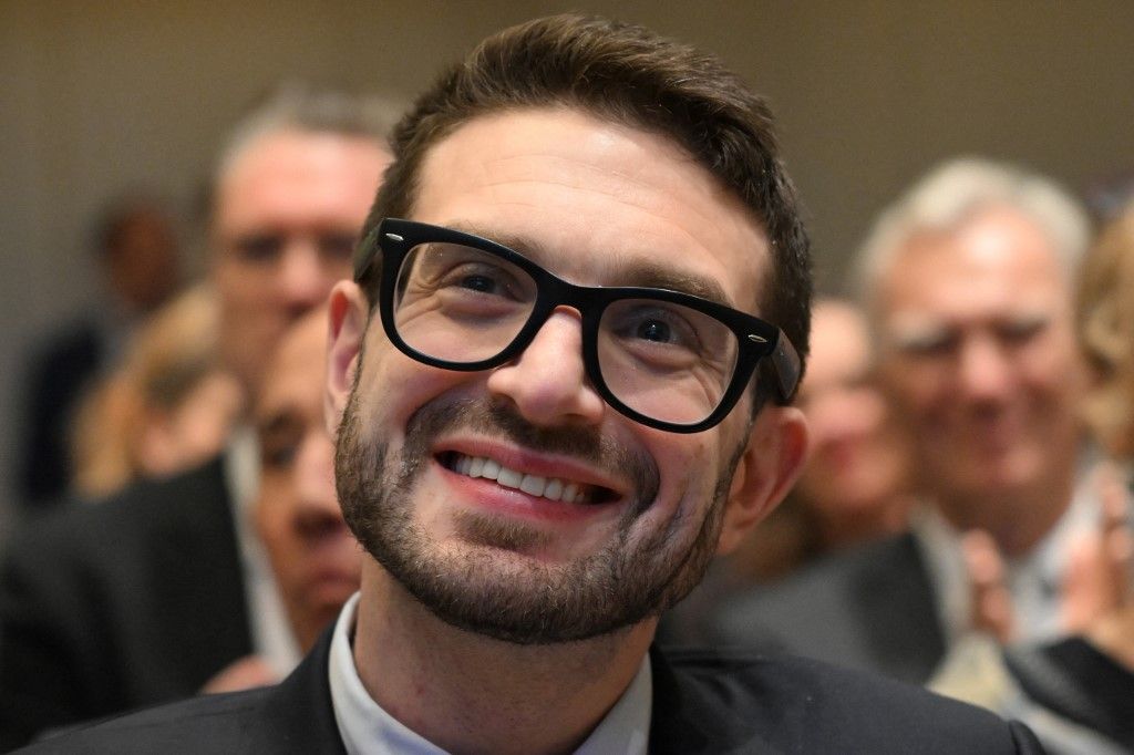 US investor and philanthropist Alexander Soros, son of Hungarian-US investor and philanthropist George Soros, smiles as he attends a ceremony to accept the "2025 Civil Rights Prize of the Sinti and Roma" on behalf of his father, on October 23, 2025 in Berlin, Germany. (Photo by RALF HIRSCHBERGER / AFP)