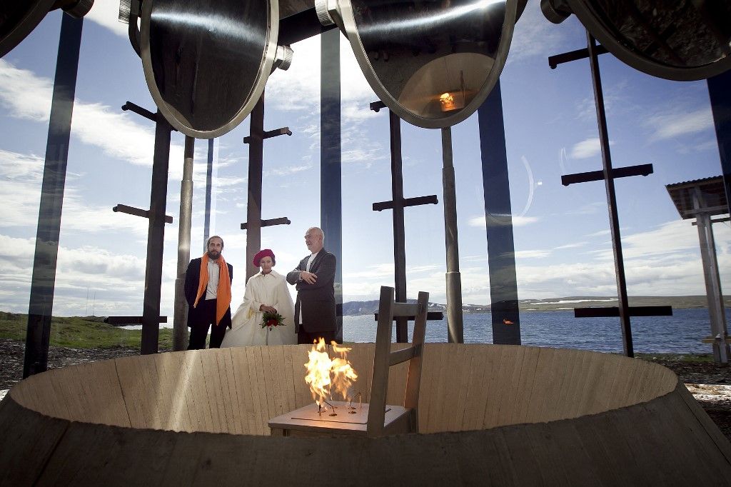Norway's Queen Sonja (C), together with architect Peter Zumthor (R) and Jerry Gorovoy, visits the glass house at Steilneset witch memorialin Vardoe on June 23, 2011. The witch monument is a memorial to 91 women who lost their lives in the witch processes. The monument is a collaboration between the artist Louise Bourgeois and architect Peter Zumthor. Vardoe is the place in Norway where most witches were condemned and burned at the stake. Between 1598 and 1692, 135 persons were indicted and 91 were executed as witches in Finnmark, the vast majority in Vardoe. Many of these were of Sami ancestry. The monument is erected at the place where the burning of witches originally happened, Steilneset in Vardoe. AFP PHOTO / SCANPIX NORWAY - Heiko Junge (Photo by HEIKO JUNGE / SCANPIX NORWAY / AFP)