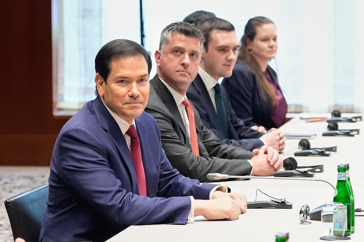 US Secretary of State Marco Rubio (L) attends a bilateral meeting with China's Foreign Minister (not in picture) in Munich, on February 13, 2026, on the sidelines of the Munich Security Conference (MSC). Heads of state and government as well as foreign and defence ministers from all over the world are expected to attend the security policy talks from February 13 to 15, 2026. (Photo by Alex Brandon / POOL / AFP)