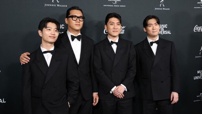 (L-R) "KPop Demon Hunters" soundtrack writers DemonYu Han Lee, Jeong Hoon Seo, Joong Gyu Kwak and Hee Dong Nam attend Universal Music Group's Grammy after party at Nya Studios West in Los Angeles on February 1, 2026. (Photo by Michael Tran / AFP)