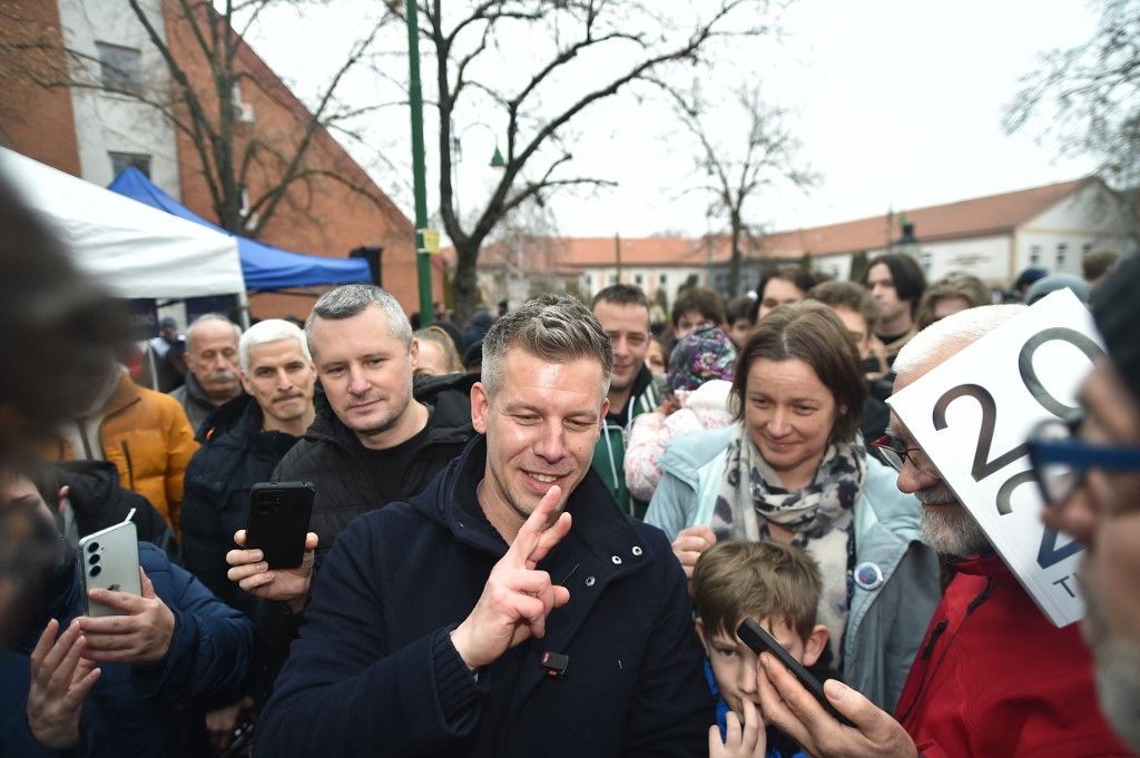 Peter Magyar, leader of the Tisza party, greets supporters during a campaign rally in Pecel, Hungary, on February 22, 2026. The campaign for the 2026 Hungarian general election kicks off yesterday. The rally comes as Peter Magyar begins a national campaign trail, planning to visit all electoral districts until the elections. (Photo by Balint Szentgallay/NurPhoto) (Photo by Balint Szentgallay / NurPhoto via AFP)