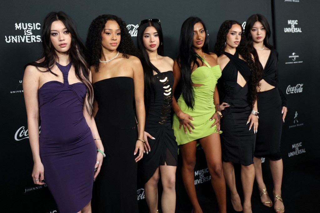 (L-R) Members of the US girl group KATSEYE Megan Skiendiel, Manon Bannerman, Sophia Laforteza, Lara Raj, Daniela Avanzini and Yoonchae Jeung attend Universal Music Group's Grammy after party at Nya Studios West in Los Angeles on February 1, 2026. (Photo by Michael Tran / AFP)