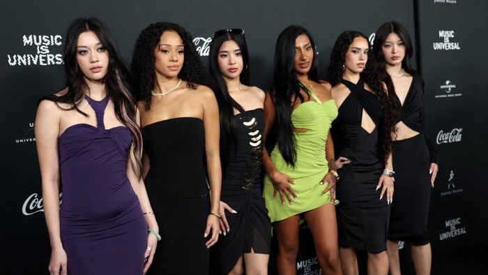 (L-R) Members of the US girl group KATSEYE Megan Skiendiel, Manon Bannerman, Sophia Laforteza, Lara Raj, Daniela Avanzini and Yoonchae Jeung attend Universal Music Group's Grammy after party at Nya Studios West in Los Angeles on February 1, 2026. (Photo by Michael Tran / AFP)