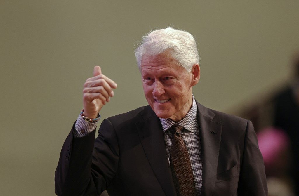 Former US President Bill Clinton prepares to speak to the congregation during morning service at Mount Zion Baptist Church as he campaigns for Vice President Kamala Harris in Albany, Georgia, October 13, 2024. The former president is stumping for Vice President Harris days before early voting starts in Georgia. (Photo by Logan Cyrus / AFP)