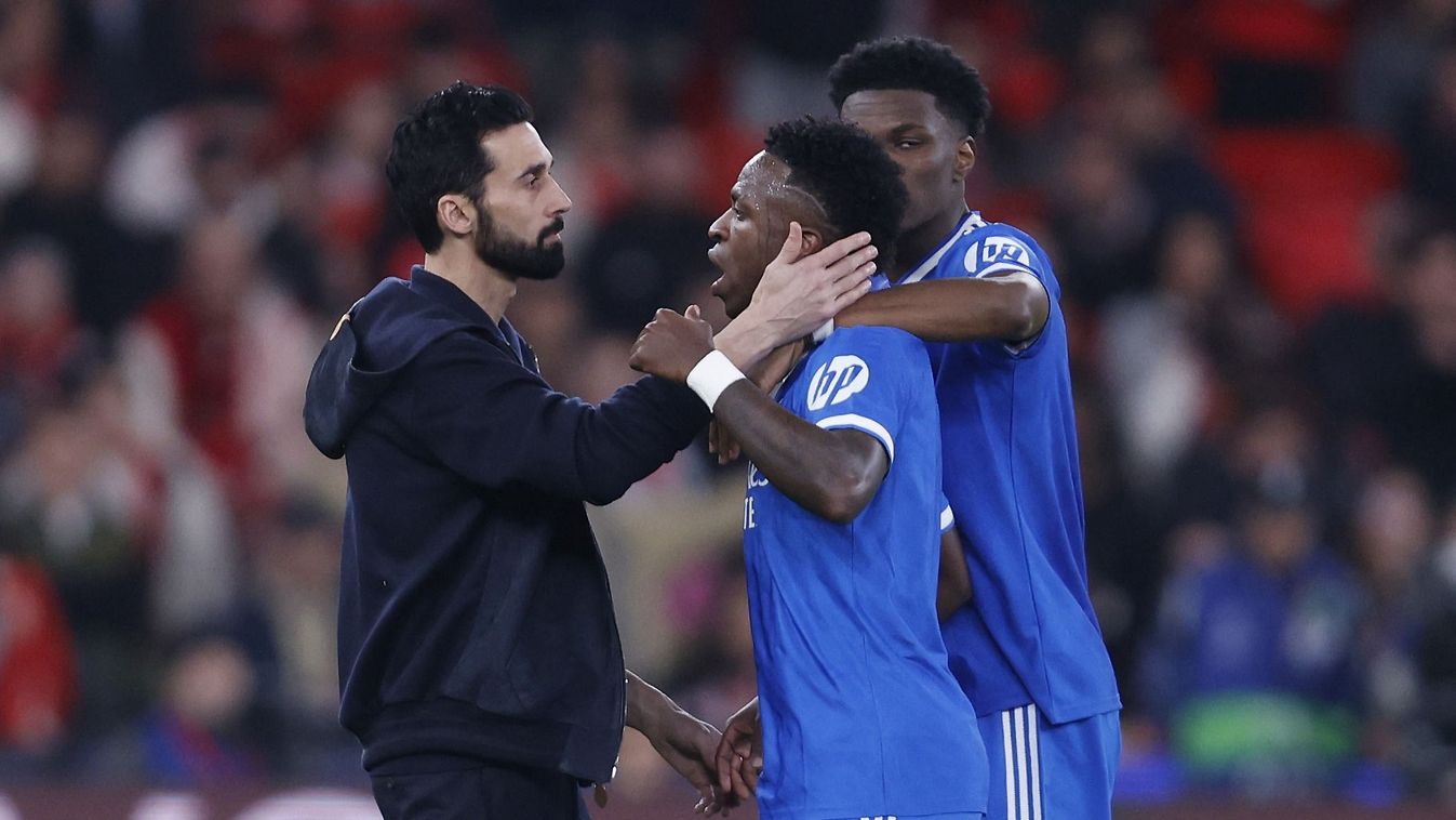 Vinícius Junior
Real Madrid's Brazilian forward #07 Vinicius Junior talks with SL Benfica's Portuguese head coach Jose Mourinho after listening racists insults during the UEFA Champions League knockout round play-off first leg football match between SL Be
