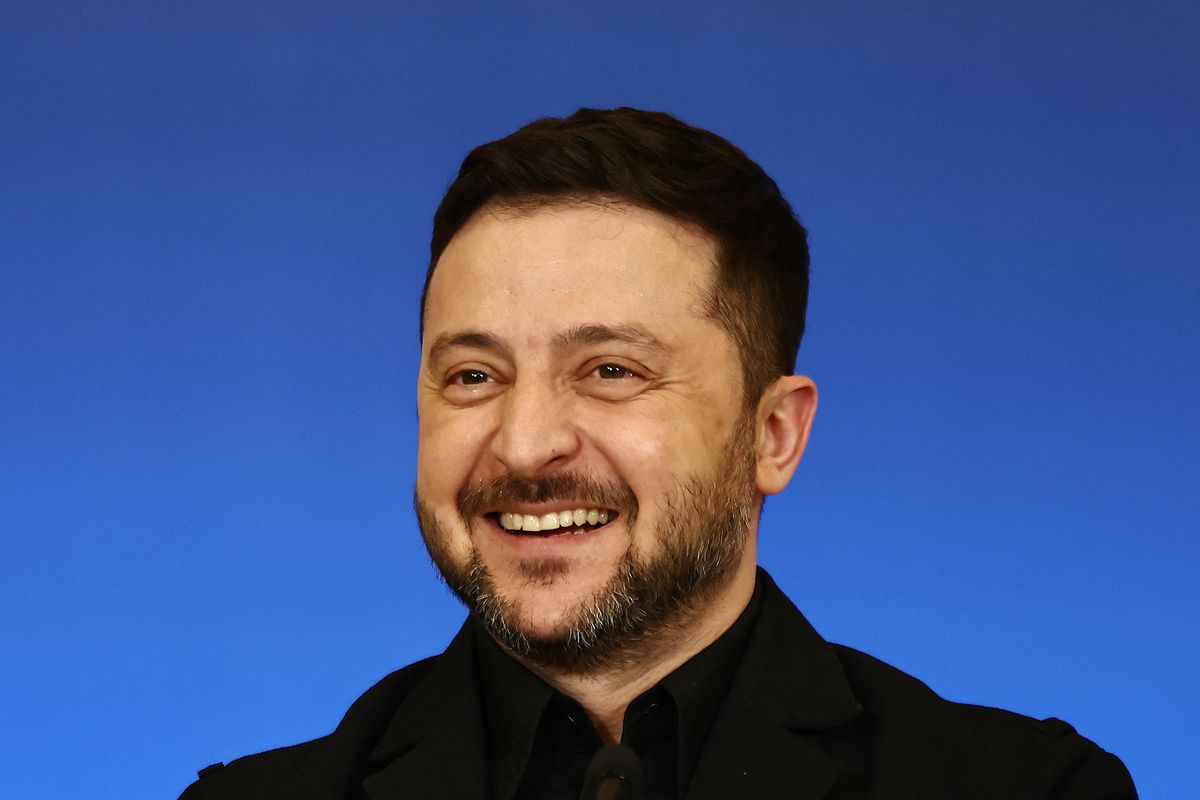 Ukraine's President Volodymyr Zelensky smiles as he attends a joint press conference following his meeting with Nordic and Baltic states leadears in Kyiv on February 24, 2026, as Ukraine marks the fourth anniversary of the Russian invasion. (Photo by Henry NICHOLLS / AFP)