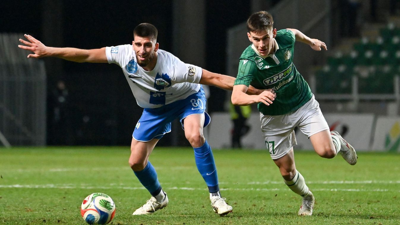 Borbély Balázs
Győr, 2026. március 13.
Adrian Zeljkovic, az MTK (b) és Vitális Milán, az ETO játékosa a labdarugó Fizz Liga 26. fordulójában játszott ETO FC - MTK Budapest mérkőzésen a győri ETO Stadionban 2026. március 13-án. ETO FC - MTK Budapest 0-0.
M