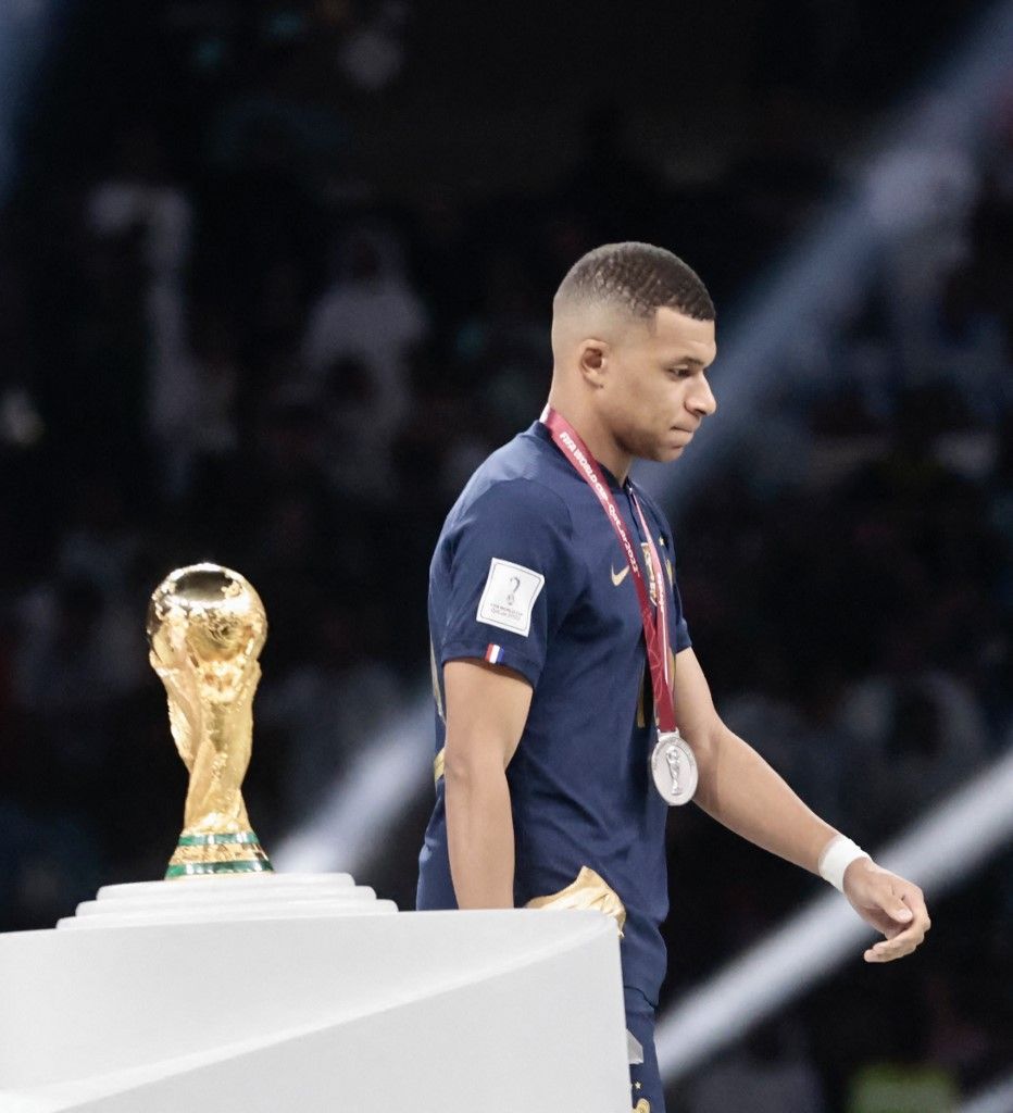 LUSAIL CITY, QATAR - DECEMBER 18: Kylian Mbappe of France is seen with the Golden Boot award during a ceremony after the FIFA World Cup 2022 Final Match between Argentina and France at Lusail Stadium in Lusail City, Qatar on December 18, 2022. Argentina beat France after penalty shoot-out to win FIFA World Cup. Mohammed Dabbous / Anadolu Agency (Photo by Mohammed Dabbous / ANADOLU AGENCY / Anadolu via AFP)