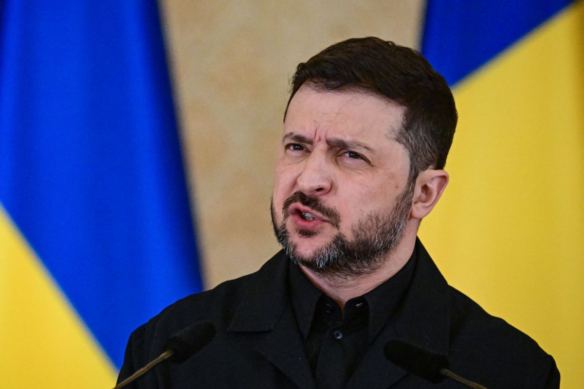 Ukrainian President Volodymyr Zelensky addresses a joint press conference with his Romanian counterpart at Cotroceni Palace, the official residence of the Romanian president, in Bucharest on March 12, 2026. Ukrainian President Zelensky arrived on March 12 in Romania, where he was to visit an F-16 fighter jet training centre and meet Romania's leader, before visiting France later this week. The visits come at a time of uncertainty over planned peace talks between Kyiv and Moscow that have been spearheaded by the United States and derailed by the US-Israeli war with Iran. (Photo by Daniel MIHAILESCU / AFP)