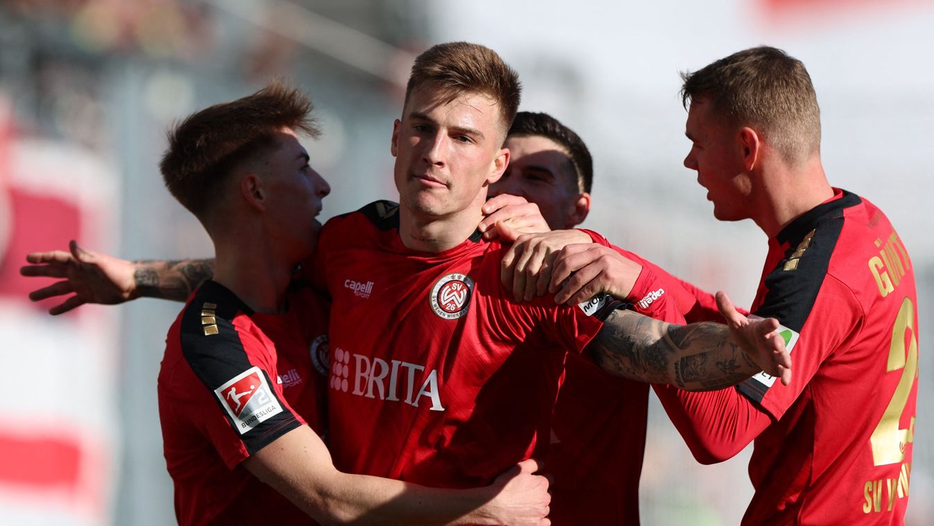 Franko Kovacevic
27 January 2024, Hesse, Wiesbaden: Soccer: Bundesliga 2, SV Wehen Wiesbaden - Hertha BSC, Matchday 19, BRITA-Arena. The scorer of the 1:0 goal, Wiesbaden's Franko Kovacevic (M), celebrates with his teammates. Photo: Jörg Halisch/dpa - IMP