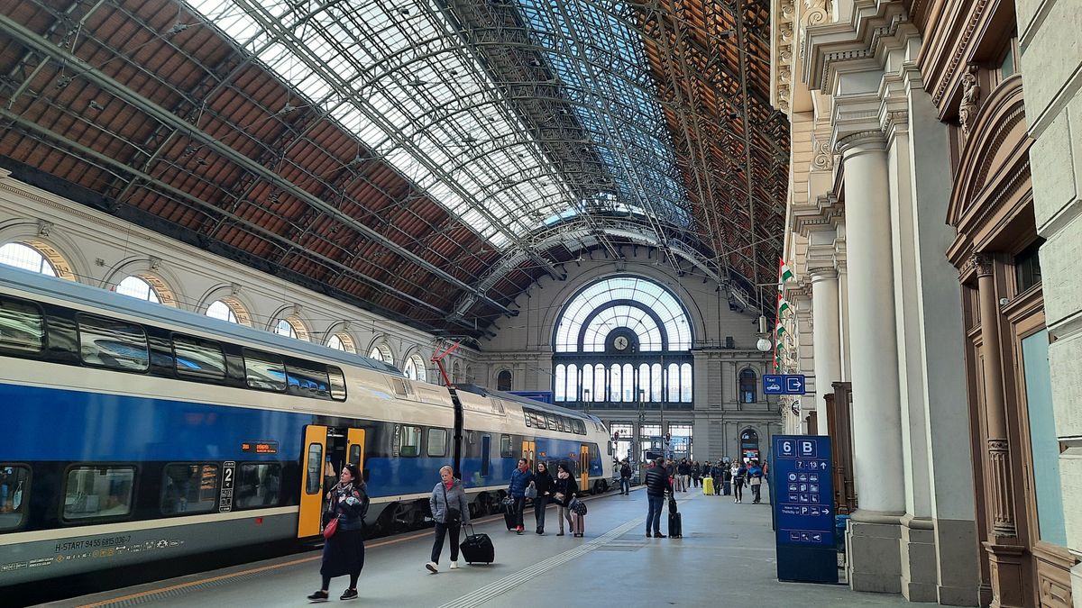 Budapest, Hungary, 02.14.20024, platform of the Keleti station with a train and walking passengers
